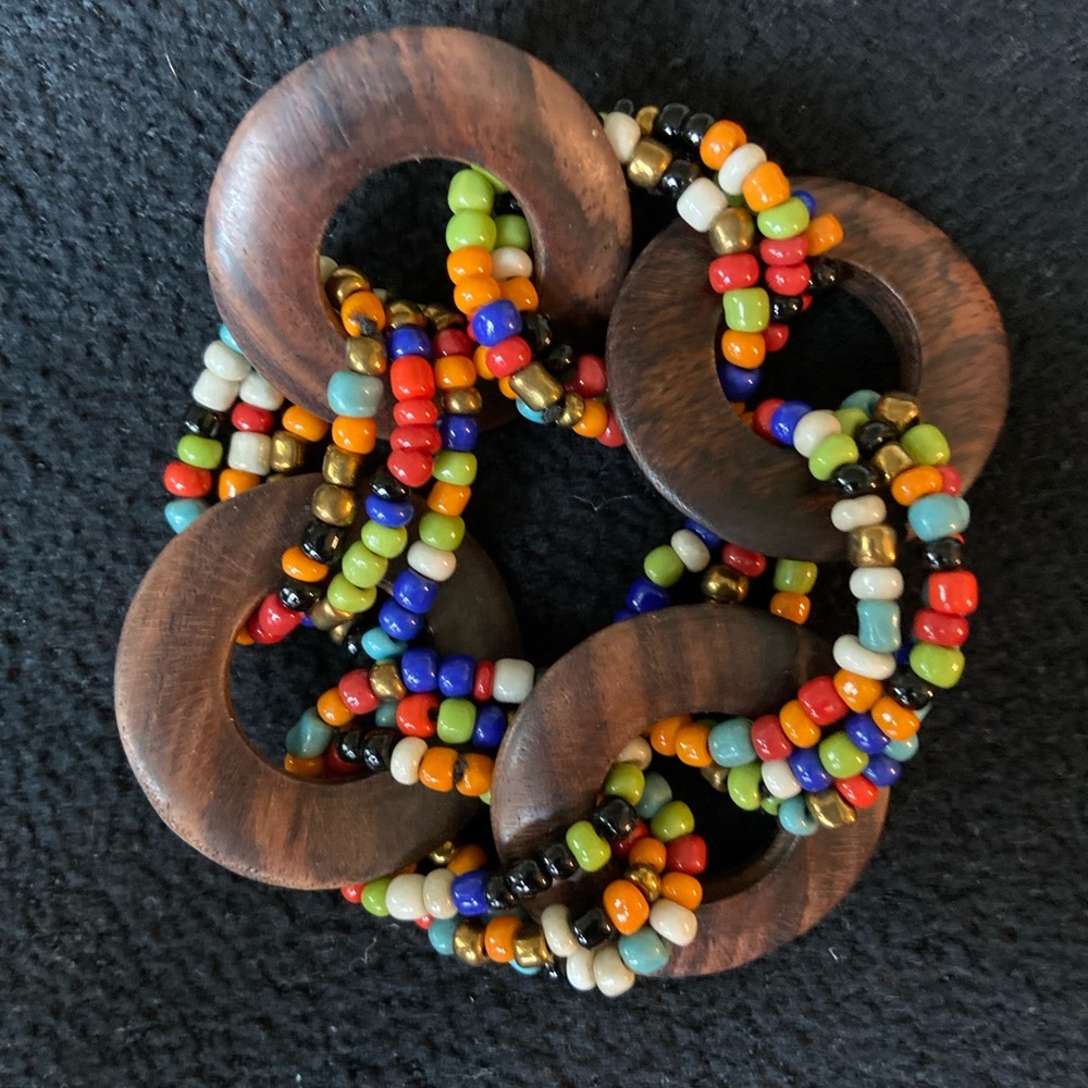 Wooden Circles and a rainbow of beads on stretchy links bracelet